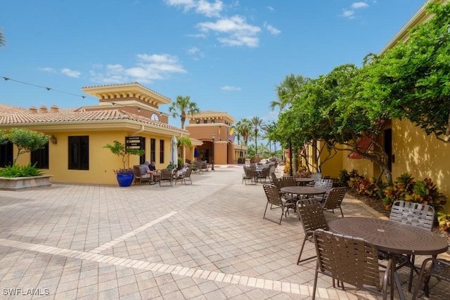 10530 Amiata Way Unit 201, Fort Myers, FL 33913 - view of patio / terrace with outdoor dining area