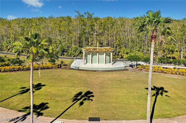 10530 Amiata Way Unit 201, Fort Myers, FL 33913 - view of grassy yard with a view of trees