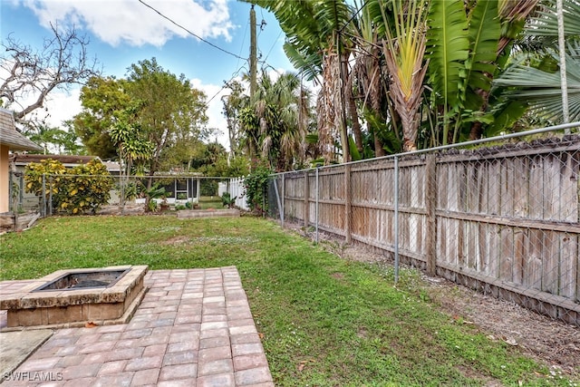 2979 Cortez Blvd, Fort Myers, FL 33901 - view of yard with a fire pit and a patio area