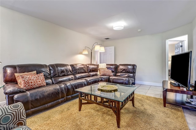 2979 Cortez Blvd, Fort Myers, FL 33901 - living area with light tile patterned flooring and baseboards