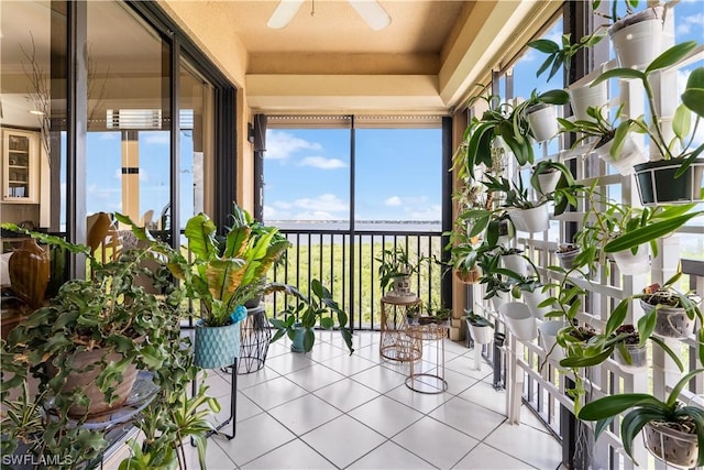 11640 Court Of Palms Unit 304, Fort Myers, FL 33908 - sunroom / solarium with tile patterned flooring and a water view