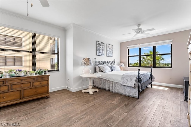 11640 Court Of Palms Unit 304, Fort Myers, FL 33908 - bedroom featuring wood finished floors, ornamental molding, and ceiling fan