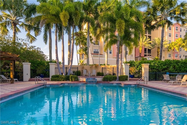 11640 Court Of Palms Unit 304, Fort Myers, FL 33908 - community pool with a patio
