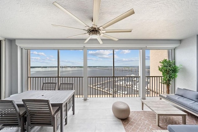 2104 W First St Unit 1402, Fort Myers, FL 33901 - sunroom / solarium featuring a water view