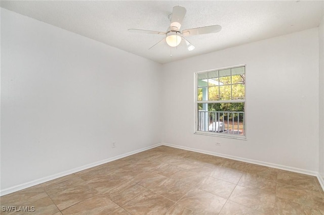 5737 Whitaker Rd Unit C203, Naples, FL 34112 - empty room featuring baseboards and ceiling fan