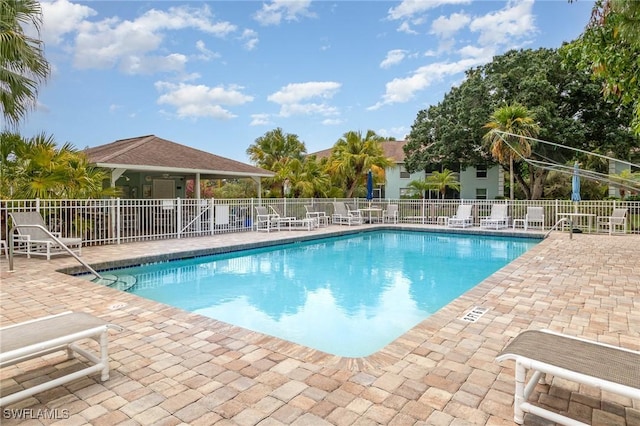 5737 Whitaker Rd Unit C203, Naples, FL 34112 - community pool with a patio