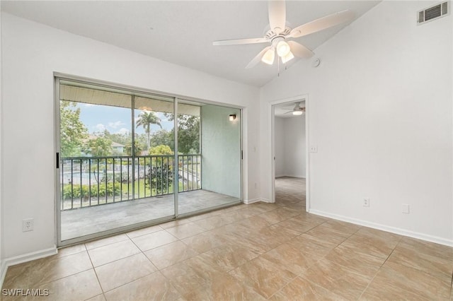 5737 Whitaker Rd Unit C203, Naples, FL 34112 - tiled spare room featuring ceiling fan, lofted ceiling, and baseboards