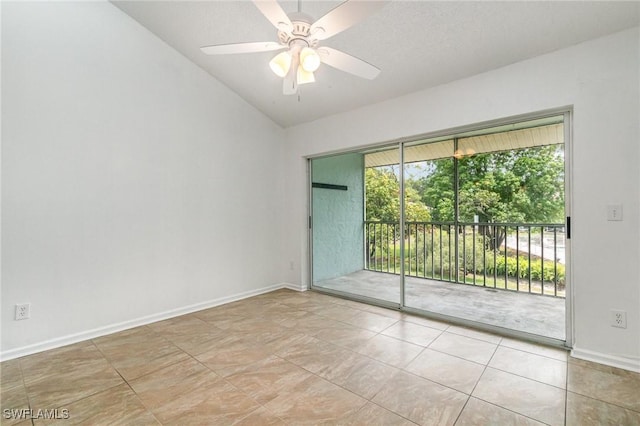 5737 Whitaker Rd Unit C203, Naples, FL 34112 - empty room featuring vaulted ceiling, ceiling fan, baseboards, and tile patterned floors