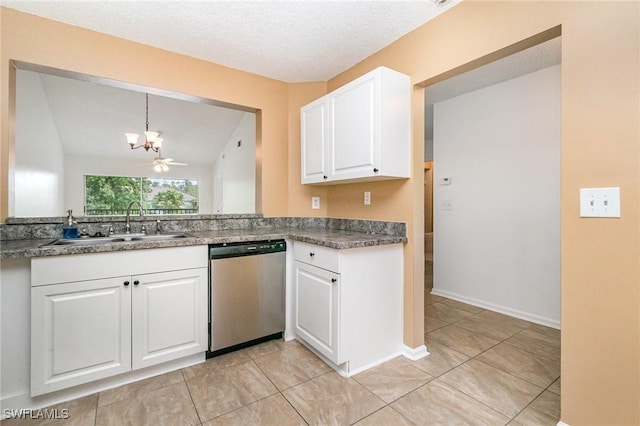 5737 Whitaker Rd Unit C203, Naples, FL 34112 - kitchen featuring stainless steel dishwasher, a chandelier, a sink, white cabinets, and vaulted ceiling