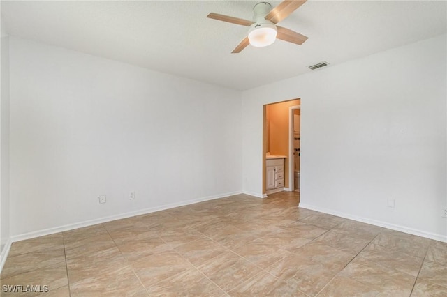 5737 Whitaker Rd Unit C203, Naples, FL 34112 - empty room with a ceiling fan and baseboards