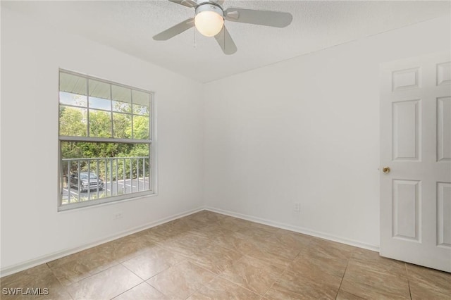 5737 Whitaker Rd Unit C203, Naples, FL 34112 - unfurnished room with a ceiling fan, baseboards, and light tile patterned flooring