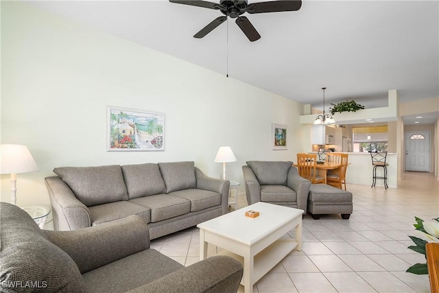 6810 Beach Resort Dr Unit 13, Naples, FL 34114 - living area featuring light tile patterned floors and ceiling fan
