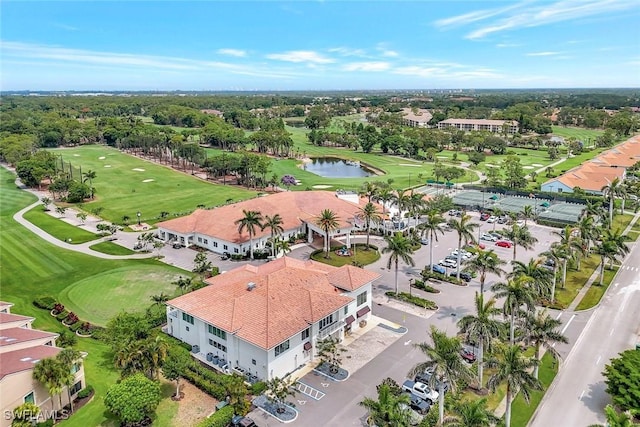 1051 Foxfire Ln Unit 309, Naples, FL 34104 - drone / aerial view of a nearby body of water and a golf club