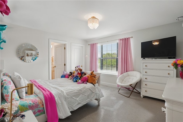 10415 Ventana Ln, Naples, FL 34120 - carpeted bedroom with baseboards and ensuite bathroom