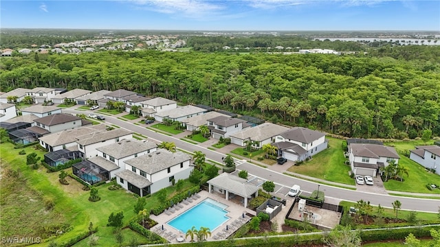10415 Ventana Ln, Naples, FL 34120 - aerial perspective of suburban area with a pool area