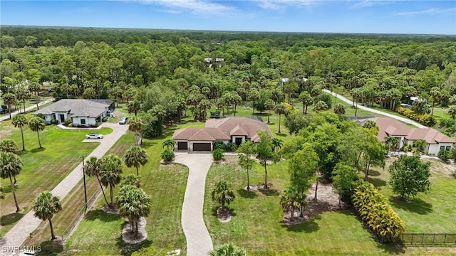 505 7th St NW, Naples, FL 34120 - view of subject property featuring a heavily wooded area
