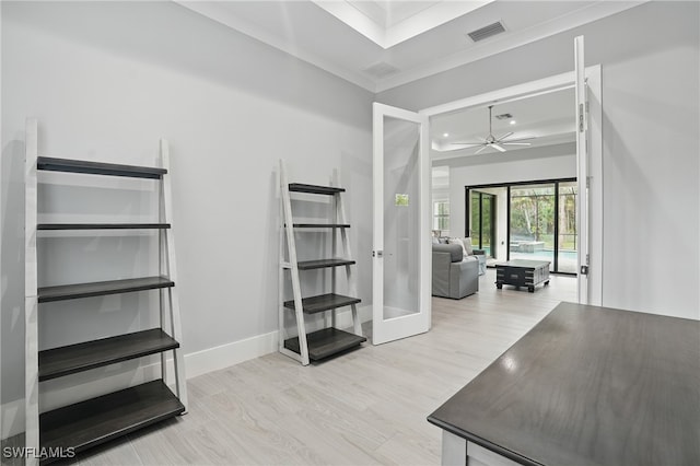 505 7th St NW, Naples, FL 34120 - interior space with a raised ceiling, baseboards, ceiling fan, wood finished floors, and french doors
