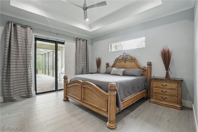 505 7th St NW, Naples, FL 34120 - bedroom featuring a raised ceiling, access to outside, light wood-style floors, ornamental molding, and ceiling fan