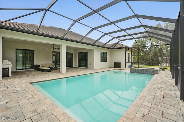 505 7th St NW, Naples, FL 34120 - view of swimming pool featuring an outdoor living space, ceiling fan, a patio, a pool with connected hot tub, and glass enclosure