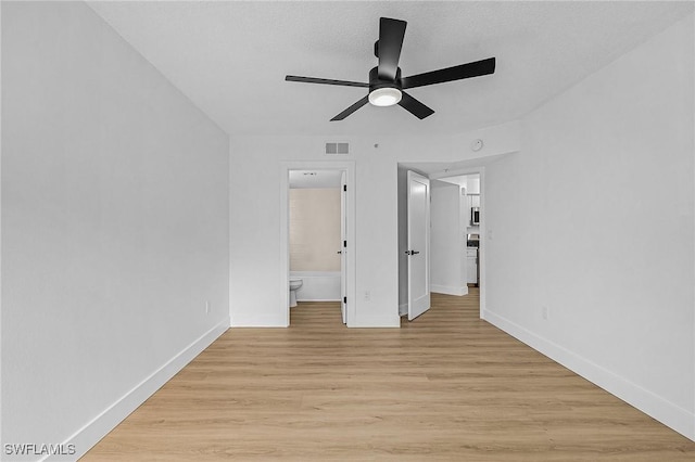 8950 Colonnades Ct E Unit 817, Bonita Springs, FL 34135 - empty room featuring ceiling fan and light wood-style flooring