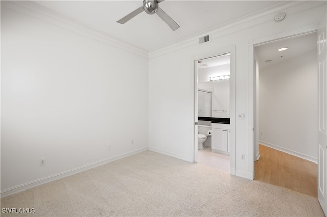 1880 Les Chateaux Blvd Unit 104, Naples, FL 34109 - unfurnished bedroom featuring carpet, ornamental molding, ensuite bathroom, and ceiling fan