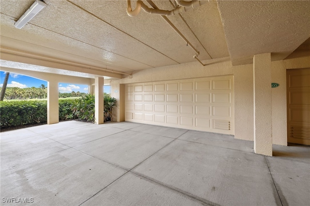 1880 Les Chateaux Blvd Unit 104, Naples, FL 34109 - view of garage