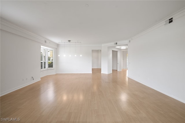 1880 Les Chateaux Blvd Unit 104, Naples, FL 34109 - unfurnished room featuring light wood-style flooring and ornamental molding