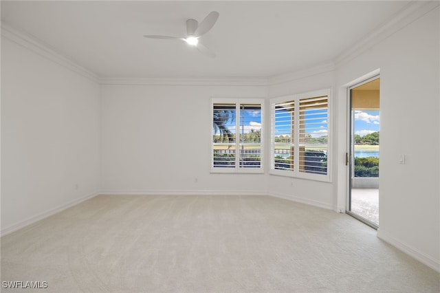 1880 Les Chateaux Blvd Unit 104, Naples, FL 34109 - unfurnished room featuring ornamental molding, light carpet, ceiling fan, and plenty of natural light