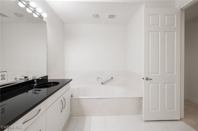 1880 Les Chateaux Blvd Unit 104, Naples, FL 34109 - bathroom with vanity and a garden tub