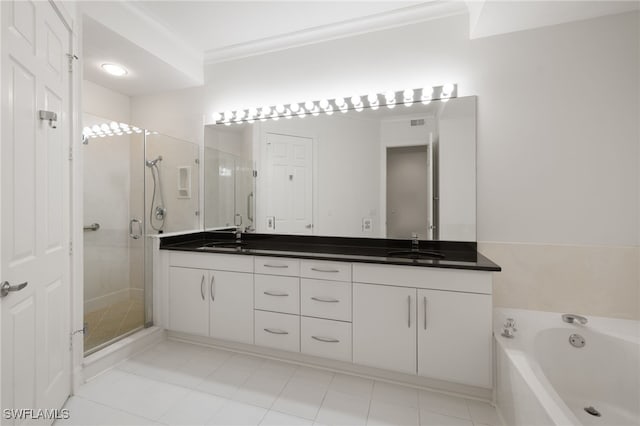 1880 Les Chateaux Blvd Unit 104, Naples, FL 34109 - full bath with double vanity, a stall shower, a bath, ornamental molding, and tile patterned flooring