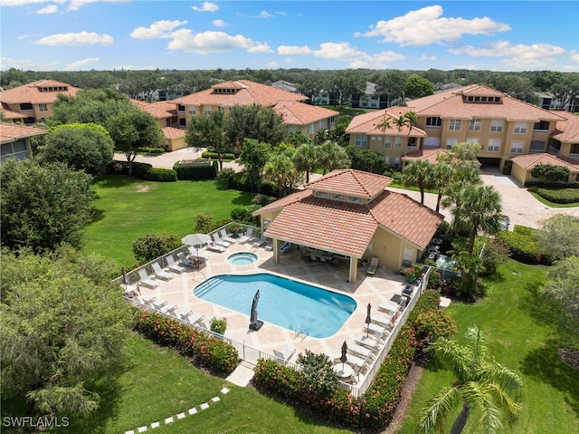 1880 Les Chateaux Blvd Unit 104, Naples, FL 34109 - community pool with a hot tub, a residential view, a gazebo, and a lawn