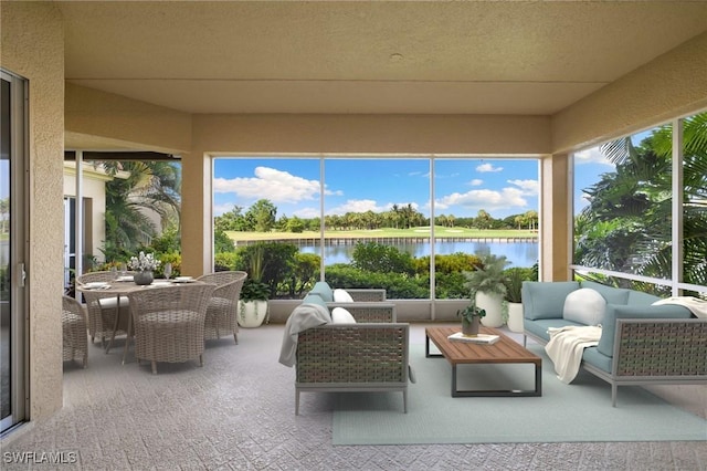 1880 Les Chateaux Blvd Unit 104, Naples, FL 34109 - sunroom / solarium featuring a water view, carpet flooring, and healthy amount of natural light
