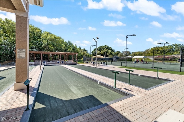 1880 Les Chateaux Blvd Unit 104, Naples, FL 34109 - view of community with a game area and a tennis court
