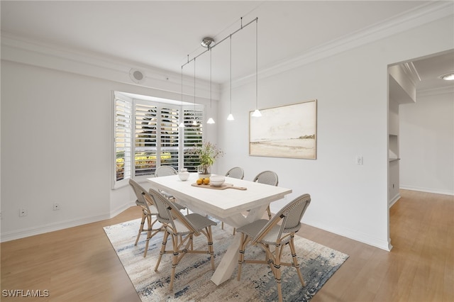 1880 Les Chateaux Blvd Unit 104, Naples, FL 34109 - dining area featuring ornamental molding and light wood-type flooring