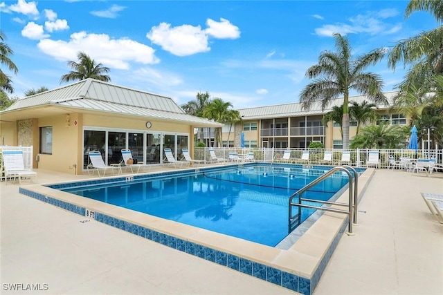 169 S Collier Blvd Unit H203, Marco Island, FL 34145 - community pool featuring a patio