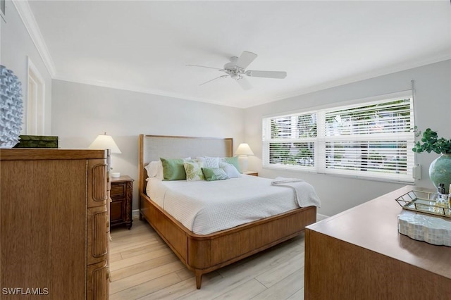 169 S Collier Blvd Unit H203, Marco Island, FL 34145 - bedroom with multiple windows, ornamental molding, light wood-type flooring, and a ceiling fan