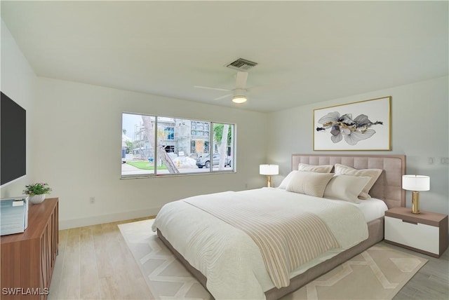 32 Fairview Blvd, Fort Myers Beach, FL 33931 - bedroom with light wood-style floors, baseboards, and a ceiling fan