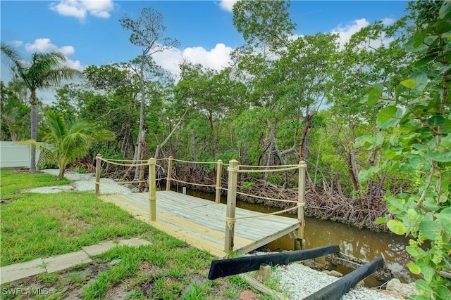 32 Fairview Blvd, Fort Myers Beach, FL 33931 - view of yard featuring a deck