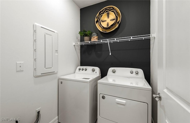 44204 Kelly Dr, Punta Gorda, FL 33982 - laundry room featuring electric panel and washing machine and clothes dryer