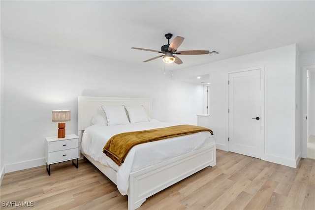 4126 Belair Ln Unit C6, Naples, FL 34103 - bedroom featuring light wood-style floors, baseboards, and ceiling fan