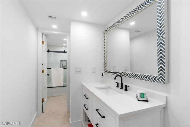 4126 Belair Ln Unit C6, Naples, FL 34103 - full bathroom with vanity, tile patterned floors, recessed lighting, and a stall shower