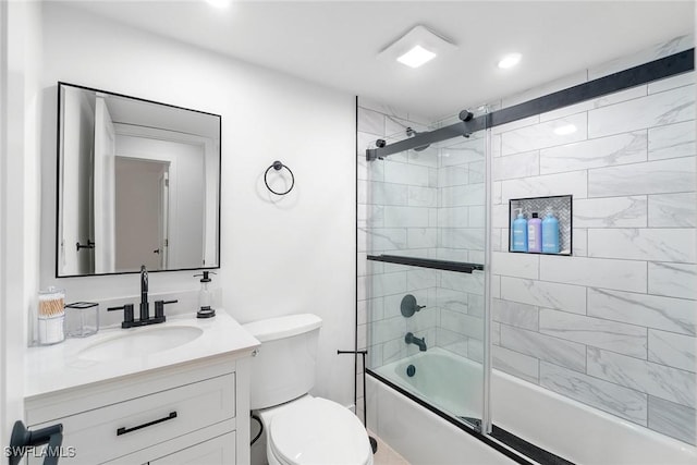 4126 Belair Ln Unit C6, Naples, FL 34103 - bathroom with vanity, enclosed tub / shower combo, and toilet