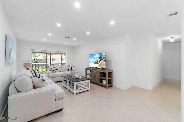 4126 Belair Ln Unit C6, Naples, FL 34103 - living room featuring recessed lighting, light tile patterned floors, and baseboards