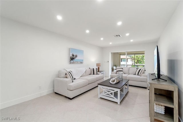 4126 Belair Ln Unit C6, Naples, FL 34103 - living room featuring recessed lighting, light tile patterned flooring, and baseboards