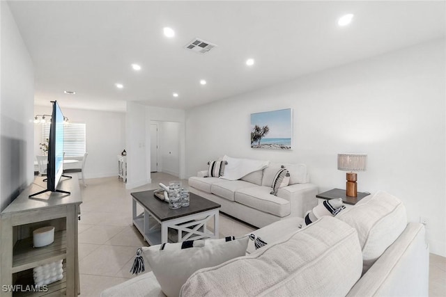 4126 Belair Ln Unit C6, Naples, FL 34103 - living room with recessed lighting, light tile patterned floors, and baseboards