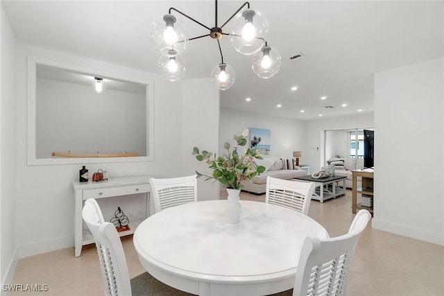 4126 Belair Ln Unit C6, Naples, FL 34103 - dining area featuring baseboards, light tile patterned floors, recessed lighting, and a chandelier