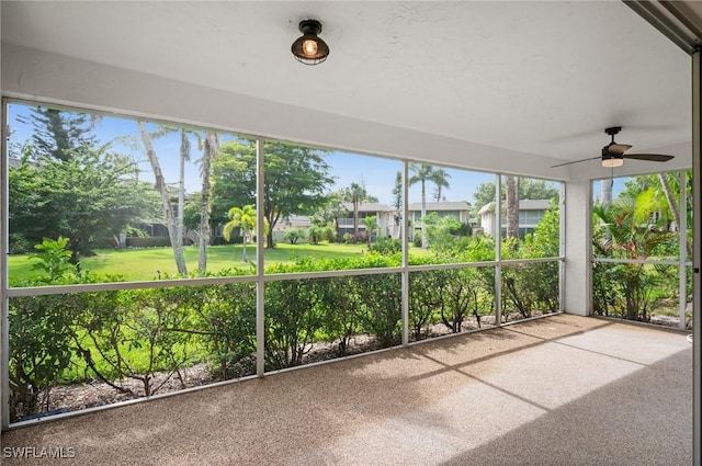 1549 Sandpiper St Unit 59, Naples, FL 34102 - unfurnished sunroom with a ceiling fan and healthy amount of natural light