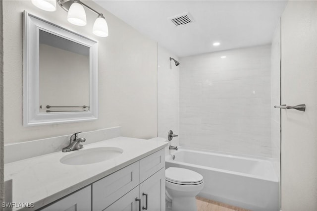 1549 Sandpiper St Unit 59, Naples, FL 34102 - full bathroom featuring vanity, toilet, shower / tub combination, and recessed lighting