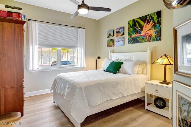 18273 Creekside Preserve Loop Unit 101, Fort Myers, FL 33908 - bedroom featuring light wood-style floors and a ceiling fan