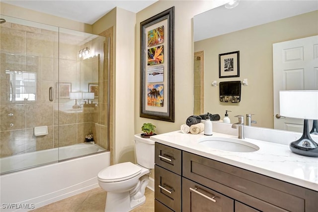 18273 Creekside Preserve Loop Unit 101, Fort Myers, FL 33908 - bathroom featuring vanity, tile patterned flooring, and enclosed tub / shower combo